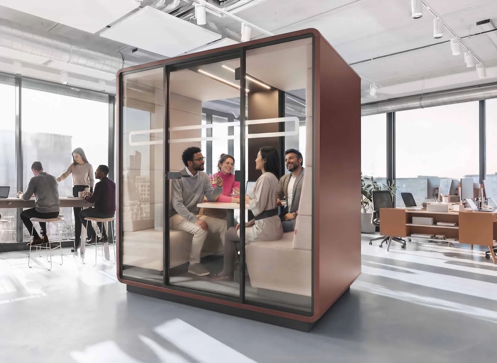 HushMeet four-person meeting pod in Clay Red in an open-plan office